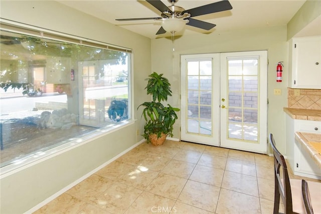 27314 Outrigger Ln, Helendale, CA 92342 - doorway to outside with french doors, plenty of natural light, a ceiling fan, and light tile patterned flooring