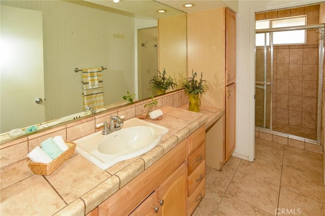 27314 Outrigger Ln, Helendale, CA 92342 - bathroom featuring a shower stall, tile patterned floors, vanity, and recessed lighting
