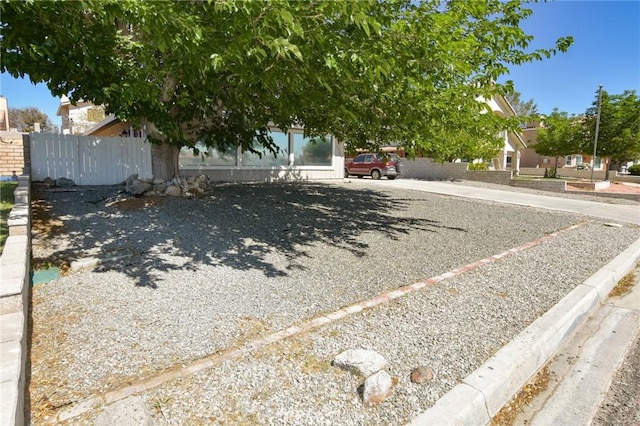 27314 Outrigger Ln, Helendale, CA 92342 - view of front of house featuring fence and uncovered parking
