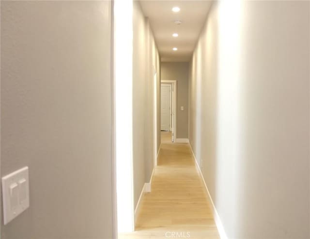 2437 Houston St, Los Angeles, CA 90033 - hallway featuring recessed lighting, light wood finished floors, and baseboards