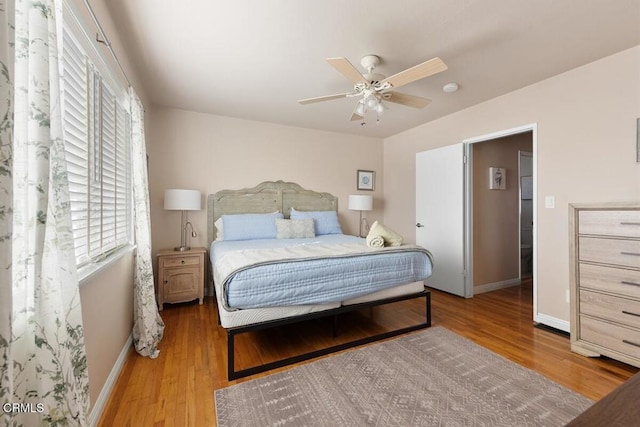 256 Melrose Dr, Oxnard, CA 93035 - bedroom with baseboards, wood finished floors, and multiple windows