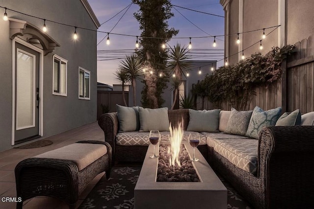 256 Melrose Dr, Oxnard, CA 93035 - fenced backyard featuring an outdoor living space with a fire pit and a patio