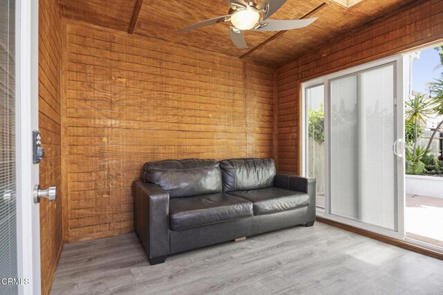 256 Melrose Dr, Oxnard, CA 93035 - sitting room featuring wood ceiling, wood walls, wood finished floors, and ceiling fan
