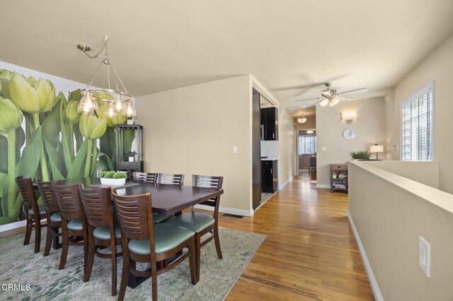 256 Melrose Dr, Oxnard, CA 93035 - dining area with wood finished floors, a ceiling fan, and baseboards