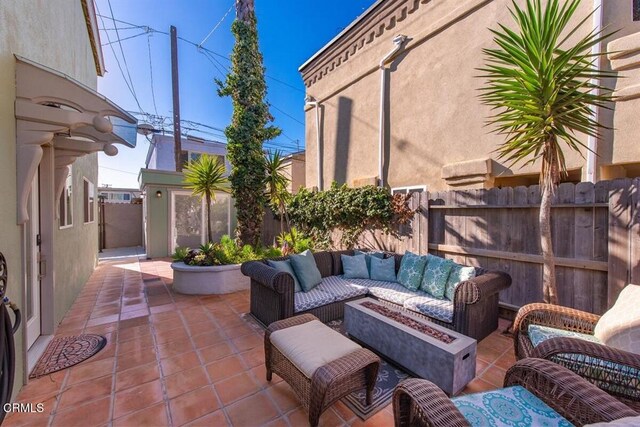 256 Melrose Dr, Oxnard, CA 93035 - view of patio with an outdoor living space with a fire pit