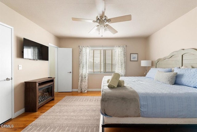 256 Melrose Dr, Oxnard, CA 93035 - bedroom featuring wood finished floors, baseboards, and ceiling fan
