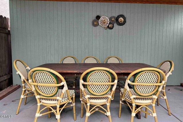 256 Melrose Dr, Oxnard, CA 93035 - dining area with concrete floors and wood walls