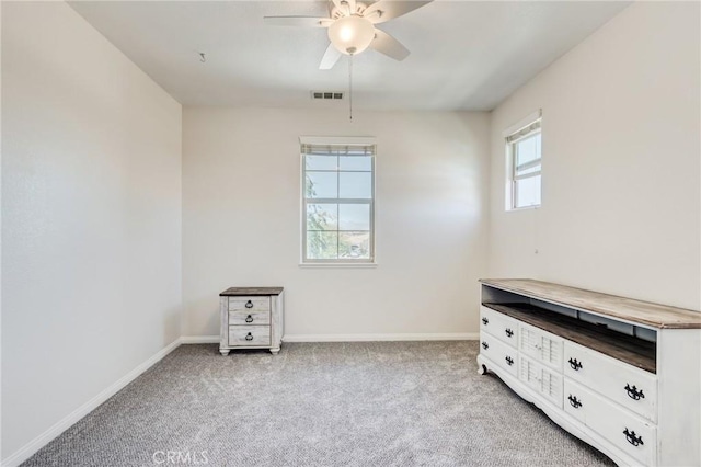 13195 Trailwood Way, Apple Valley, CA 92308 - empty room with ceiling fan, light colored carpet, and baseboards