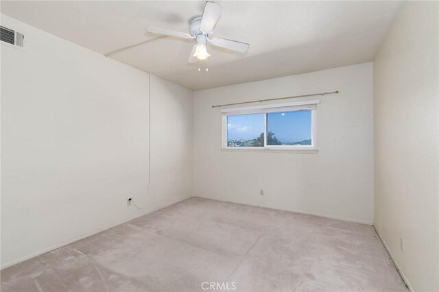 1158 Regal Canyon Dr, Walnut, CA 91789 - unfurnished room with light colored carpet and a ceiling fan