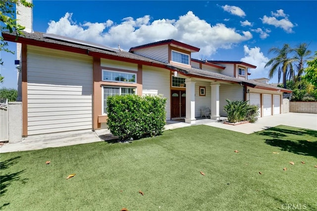 1158 Regal Canyon Dr, Walnut, CA 91789 - view of front facade with concrete driveway, solar panels, and a garage