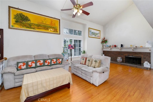 1158 Regal Canyon Dr, Walnut, CA 91789 - living room featuring light wood finished floors, a ceiling fan, vaulted ceiling, and a fireplace