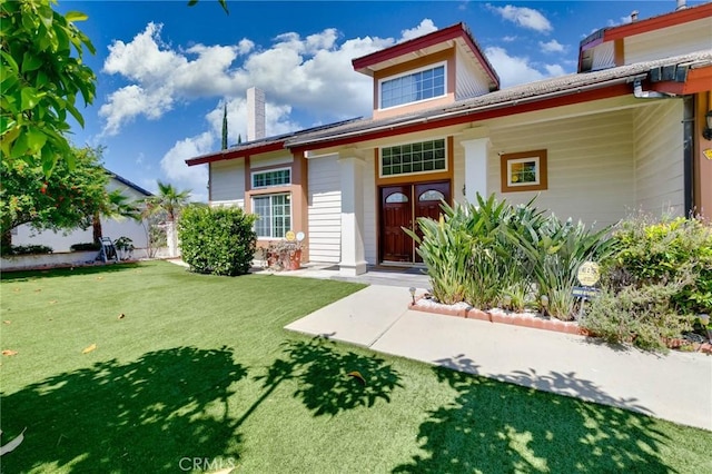 1158 Regal Canyon Dr, Walnut, CA 91789 - view of front of property with a front yard and a chimney