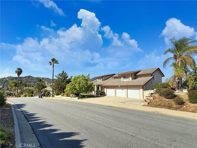 1158 Regal Canyon Dr, Walnut, CA 91789 - view of asphalt street with curbs and a mountain view