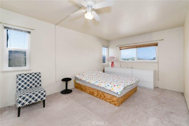 1158 Regal Canyon Dr, Walnut, CA 91789 - bedroom with multiple windows, light colored carpet, and baseboards