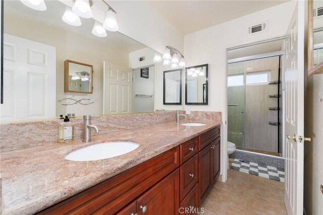 1158 Regal Canyon Dr, Walnut, CA 91789 - bathroom featuring toilet, a shower stall, and double vanity