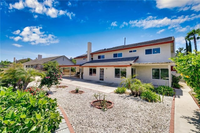 1158 Regal Canyon Dr, Walnut, CA 91789 - back of property featuring stucco siding and a patio