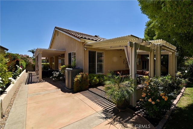 29424 Springside Dr, Menifee, CA 92584 - back of house with a pergola, central AC, stucco siding, a patio, and a tiled roof