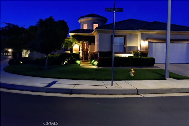 29424 Springside Dr, Menifee, CA 92584 - view of front of house featuring driveway, stucco siding, a garage, a tiled roof, and a yard