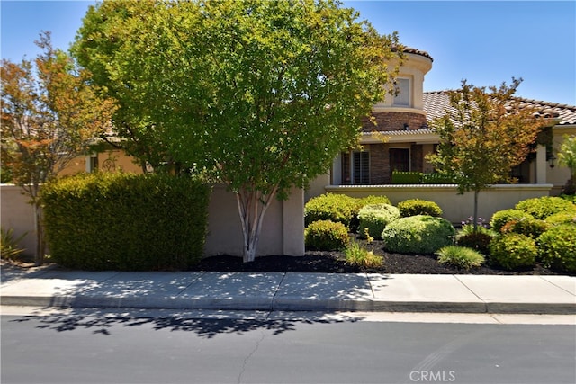 29424 Springside Dr, Menifee, CA 92584 - view of front of house featuring a tiled roof and stucco siding