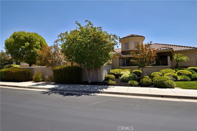 29424 Springside Dr, Menifee, CA 92584 - view of front of property with a tile roof and stucco siding