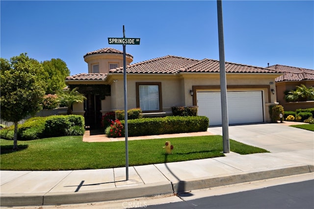 29424 Springside Dr, Menifee, CA 92584 - mediterranean / spanish-style house with a garage, a front lawn, driveway, a tiled roof, and stucco siding