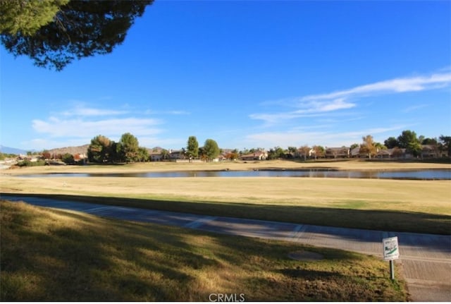 29424 Springside Dr, Menifee, CA 92584 - view of community with a water view and a yard
