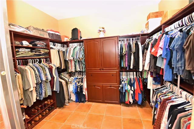 29424 Springside Dr, Menifee, CA 92584 - spacious closet featuring light tile patterned floors