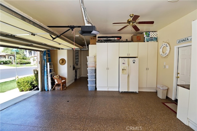 29424 Springside Dr, Menifee, CA 92584 - garage featuring white fridge with ice dispenser, a garage door opener, and a ceiling fan