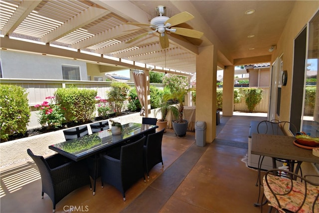 29424 Springside Dr, Menifee, CA 92584 - fenced backyard with a pergola, a patio area, outdoor dining area, and ceiling fan