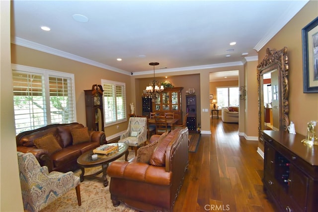 29424 Springside Dr, Menifee, CA 92584 - living area with a chandelier, wood finished floors, baseboards, recessed lighting, and ornamental molding