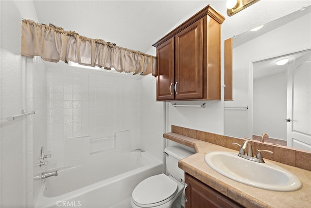 full bathroom featuring vanity, toilet, and washtub / shower combination