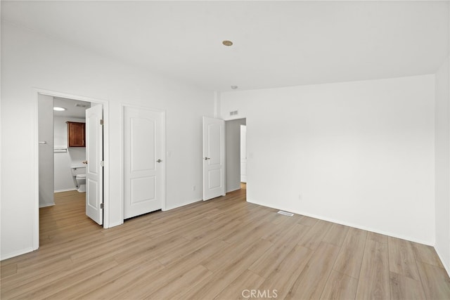 2851 Rolling Hills Dr Unit 224, Fullerton, CA 92835 - unfurnished bedroom featuring light wood-type flooring and recessed lighting