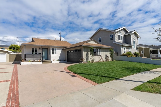 20010 Ingrum Way, Torrance, CA 90503 - view of front facade with driveway, stucco siding, a garage, and a front lawn