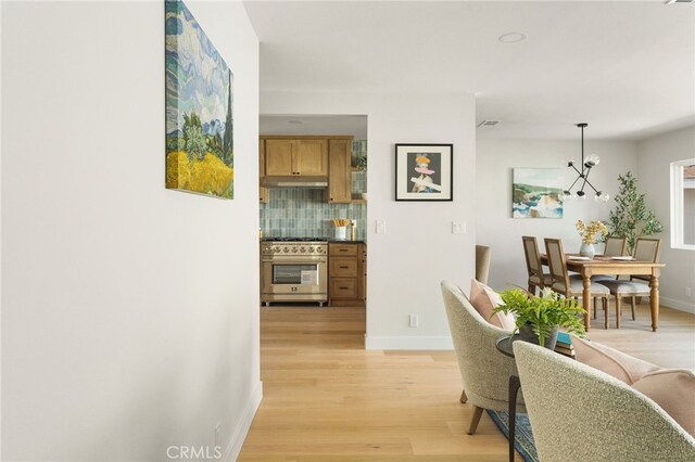20010 Ingrum Way, Torrance, CA 90503 - hallway featuring light wood-type flooring and baseboards