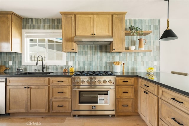 20010 Ingrum Way, Torrance, CA 90503 - kitchen with stainless steel range, a sink, under cabinet range hood, and dark countertops