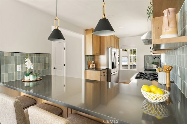 20010 Ingrum Way, Torrance, CA 90503 - kitchen featuring stainless steel fridge, exhaust hood, decorative backsplash, and dark countertops