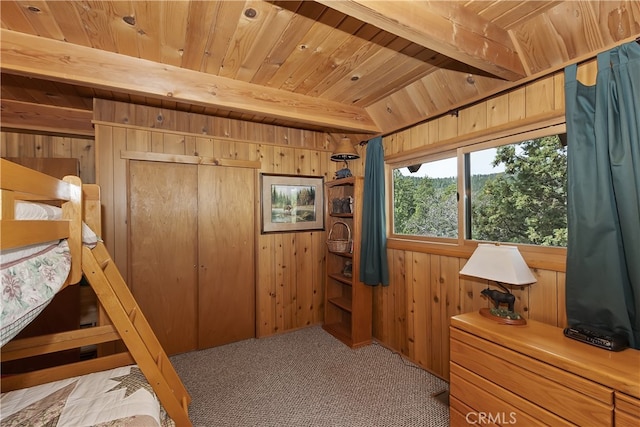 43214 Sunset Dr, Big Bear Lake, CA 92315 - bedroom featuring wood walls, wooden ceiling with exposed beams, and carpet floors
