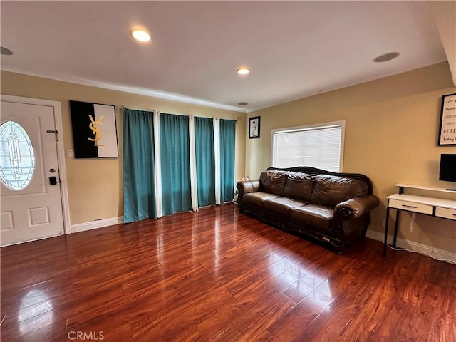 6127 Adenmoor Ave, Lakewood, CA 90713 - living room with wood finished floors, baseboards, healthy amount of natural light, and recessed lighting