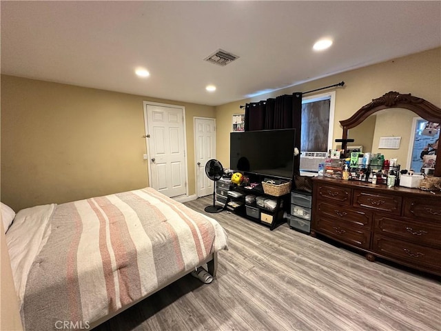 6127 Adenmoor Ave, Lakewood, CA 90713 - bedroom featuring light wood-type flooring and recessed lighting