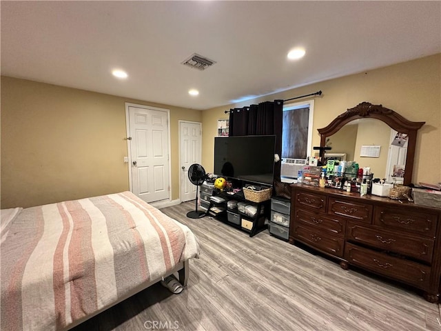 6127 Adenmoor Ave, Lakewood, CA 90713 - bedroom featuring light wood finished floors and recessed lighting
