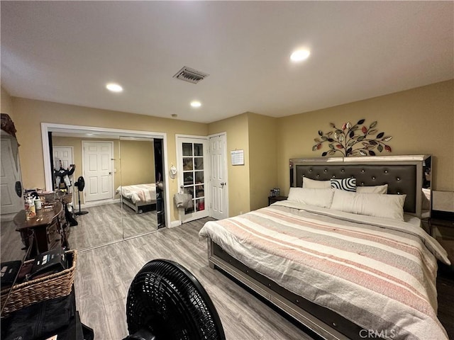6127 Adenmoor Ave, Lakewood, CA 90713 - bedroom with wood finished floors, recessed lighting, and baseboards