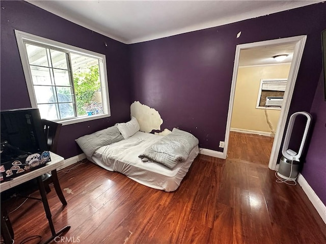 6127 Adenmoor Ave, Lakewood, CA 90713 - bedroom with hardwood / wood-style flooring and baseboards