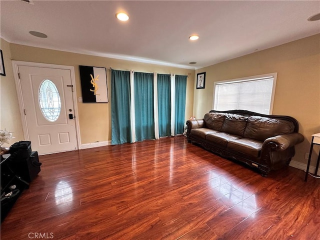 6127 Adenmoor Ave, Lakewood, CA 90713 - living room featuring wood finished floors, healthy amount of natural light, baseboards, and recessed lighting