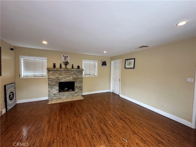 6127 Adenmoor Ave, Lakewood, CA 90713 - unfurnished living room featuring a fireplace, baseboards, wood finished floors, and recessed lighting