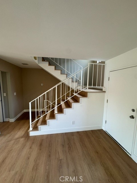 171 Junipero Serra Dr Unit D, San Gabriel, CA 91776 - stairs with wood finished floors and baseboards