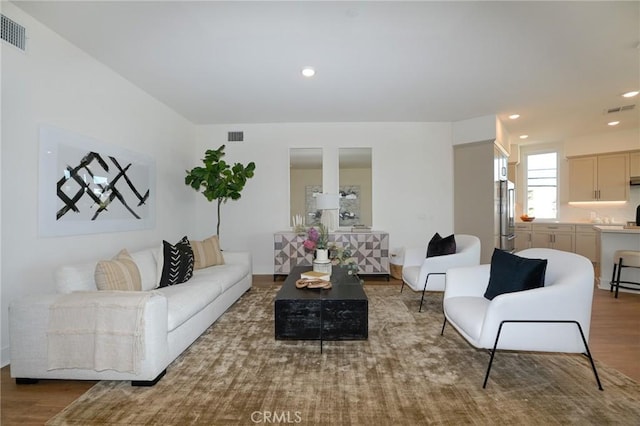 414 Main Unit 200, Huntington Beach, CA 92648 - living room featuring wood finished floors and recessed lighting