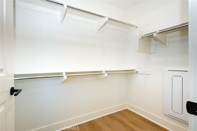 414 Main Unit 200, Huntington Beach, CA 92648 - spacious closet featuring wood finished floors and heating unit