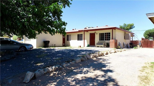 15212 Las Piedras Dr, Victorville, CA 92395 - view of front of property with stucco siding and fence