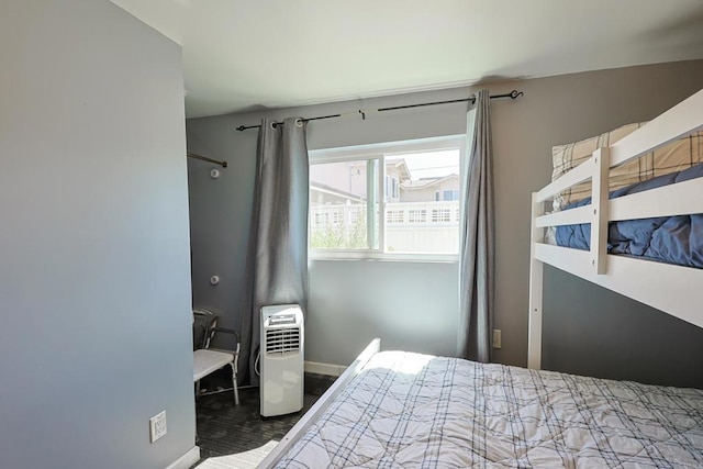 6683 Ballinger Ave, San Diego, CA 92119 - bedroom featuring baseboards and wood finished floors
