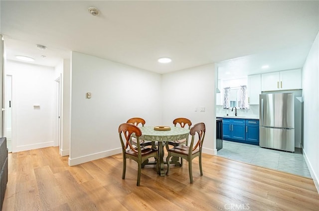 1108 Camino Real Unit 306, Redondo Beach, CA 90277 - dining area featuring light wood-style floors, baseboards, and recessed lighting